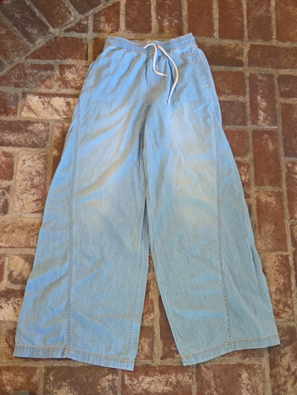 Altar'd State light blue denim with gold stitching